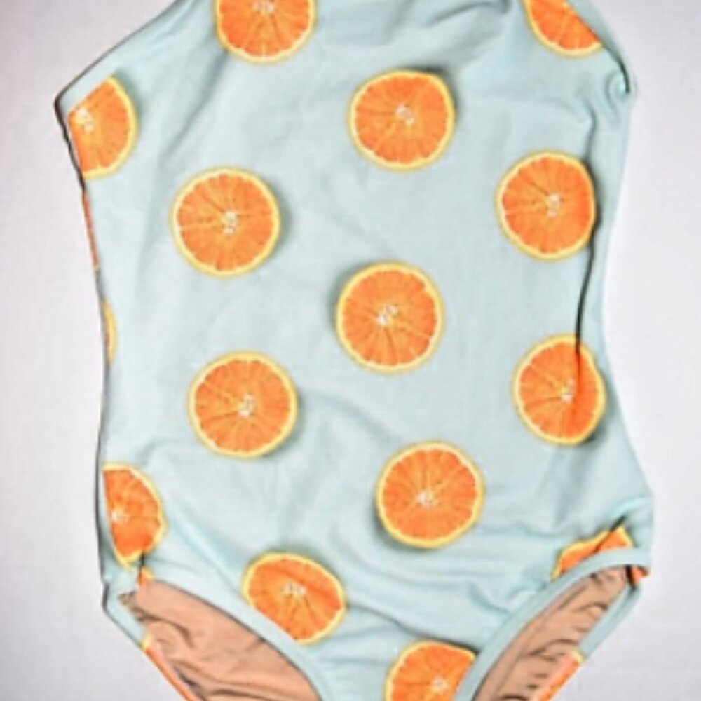Mint green bathing suit with orange slices